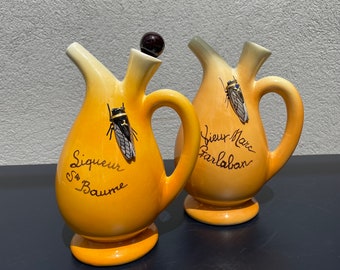 Pitcher/jug, vieux Marc Garlaban and pitcher/cruche liqueur Janot Ste Baume, cicadas, F.Sicard Vallauris.