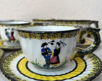 8 pcs coffee cups with saucers by Henriot Quimper decor Breton couple. Earthenware, hand painted and signed. Excellent condition. Price/pc.