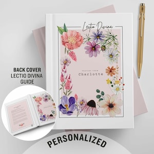 May include: A white journal with a floral design on the cover. The journal is titled "Lectio Divina" and says "Prayers from Charlotte" on the inside. The back cover says "Back Cover Lectio Divina Guide".