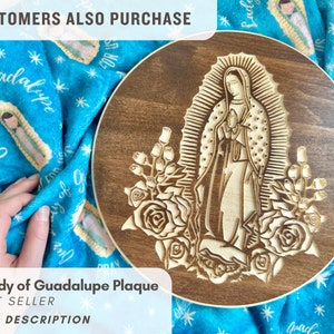 May include: A wooden plaque with a laser-engraved image of Our Lady of Guadalupe. The image is surrounded by roses and the plaque has a brown wood finish.