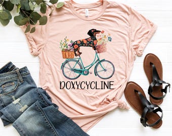 Doxycycline Pharmacy T Shirt, Dachshund on Bicycle Pharmacists Shirt, Veterinary Pharmacists Technicians Shirt, Pharmacy Shirt