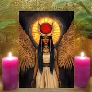 May include: An artistic print of a woman with wings, a red sun halo, and a gold headdress. The image is flanked by two lit pink candles, plants, and gold decorative objects. The background is a gold floral pattern.