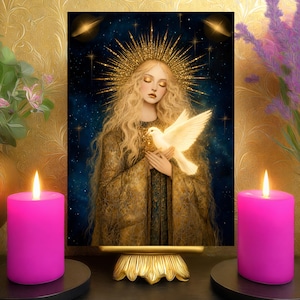 May include: A rectangular wall art print featuring a long-haired figure with a golden halo, holding a white dove against a dark blue starry night sky background. The artwork is displayed on a gold stand between two bright pink pillar candles.