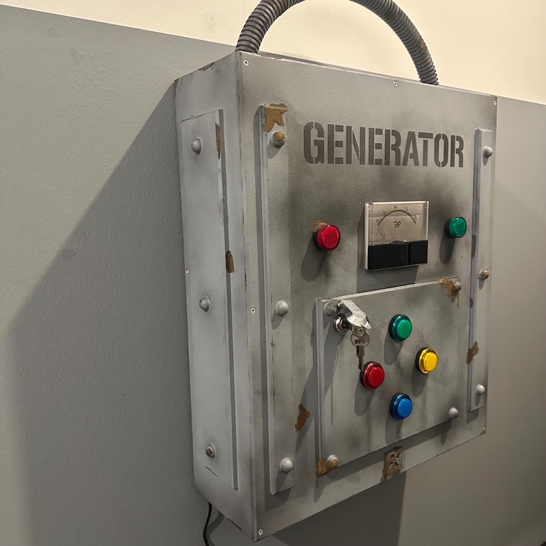 May include: A gray metal box with the word "GENERATOR" printed on it. The box has a variety of buttons, a keyhole, and a small gauge with a needle pointing to the number 20.