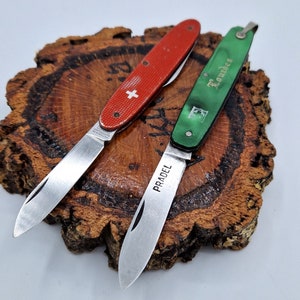 Swiss pocket knife, tourist, old, reliable, high-quality, lot of two pieces,multitool, univeersal knif, Swiss knife, stainless, Victorinox