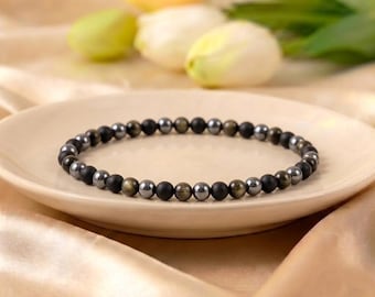 Verfijnde armband met drievoudige bescherming, natuurlijke zwarte toermalijn, hematiet, obsidiaan met gouden glans en zwarte onyx.