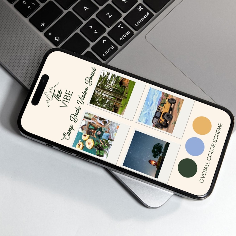 May include: A smartphone screen displaying a vision board with photos of a cabin in the woods, a jeep, a campfire, and a starry night sky. The text "The Vibe Camp Bach Vision Board" is at the top of the screen. Below the photos is a colour palette with three circles in shades of green, blue, and yellow.