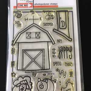 May include: A clear sheet of photopolymer stamps with a farm theme. The stamps include a barn, a pig, a sheep, a chicken, a bee, a compass, a door, and the words "for", "hay", "special", "thaday", "happy", "bug off", "sheepish", "oink", "cute", "ci-ci-o", "el-el-o", and "www.thealleywaystamps.com".