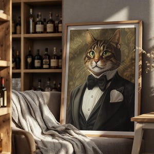 May include: A framed portrait of a cat dressed in a tuxedo, bow tie, and pocket square. The cat has green eyes and a distinguished expression. The artwork is displayed in a room with a wooden shelf filled with bottles.