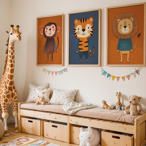 May include: A children's bedroom scene featuring a large giraffe, a wooden bench with storage, and three framed animal art prints. The prints depict a monkey, tiger, and lion. Decorative pillows, stuffed animals, and a rug complete the playful decor.