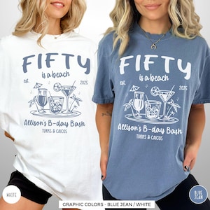two women wearing t - shirts that say fifty and a beach