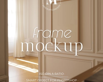 May include: A mockup of a light wood frame with a white mat and a white background. The frame is hanging on a white wall with white trim. The text "ISO DIN A RATIO", "SMART OBJECT FOR PHOTOSHOP", and "PSD & JPG FILES" is visible below the frame.