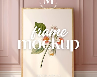 May include: A gold frame mockup with a white background and a floral illustration of a pink and white flower with green leaves. The text "frame mockup" is written in white letters on the image. The text "ISO DIN A RATIO" and "SMART OBJECT FOR PHOTOSHOP" are written in black letters at the bottom of the image.