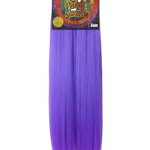May include: A bundle of vibrant purple braiding hair, with a tag at the top. The tag features the text "HAIRSHOP" and "Braids Kanekalon" in a colorful design. The hair is a solid, bright purple color.