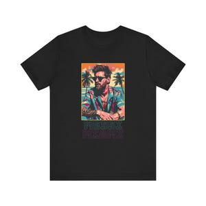 May include: Black t-shirt featuring a retro-style illustration of a man wearing sunglasses and a tropical shirt. The text "MESSI MIAMI" is printed below the image.