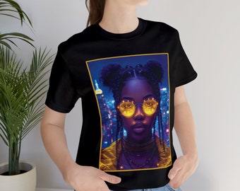 May include: Black t-shirt with a graphic print of a woman with yellow sunglasses and braided hair in front of a city lights background.