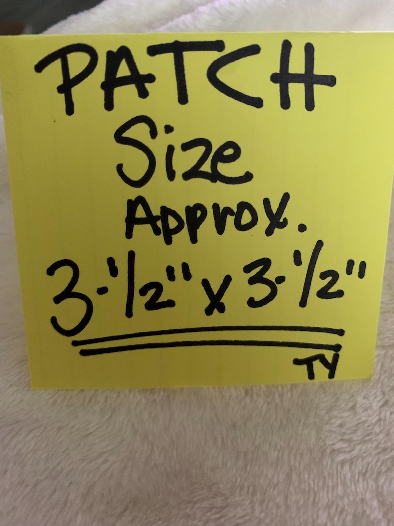 May include: A yellow square with the words "PATCH Size Approx." written in black. Below the text is "3-1/2" x 3-1/2"" in black. The patch is approximately 3.5 inches by 3.5 inches.