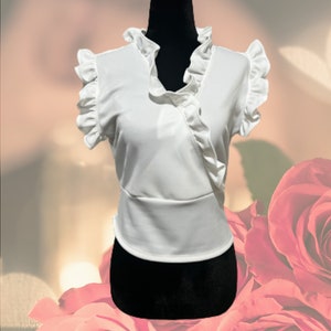 Women&#39;s Sleeveless Blouse with Ruffles