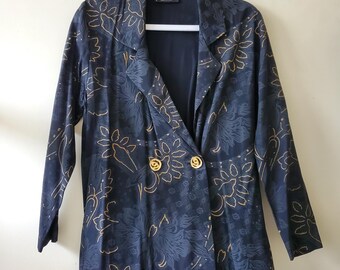 Chaqueta tipo blazer negra estampada estilo vintage de los años 90 con botones dorados.