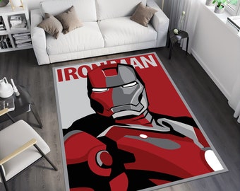 May include: A red and gray rug with a graphic illustration of Iron Man. The rug has a gray border and the text "IRON MAN" in white letters.