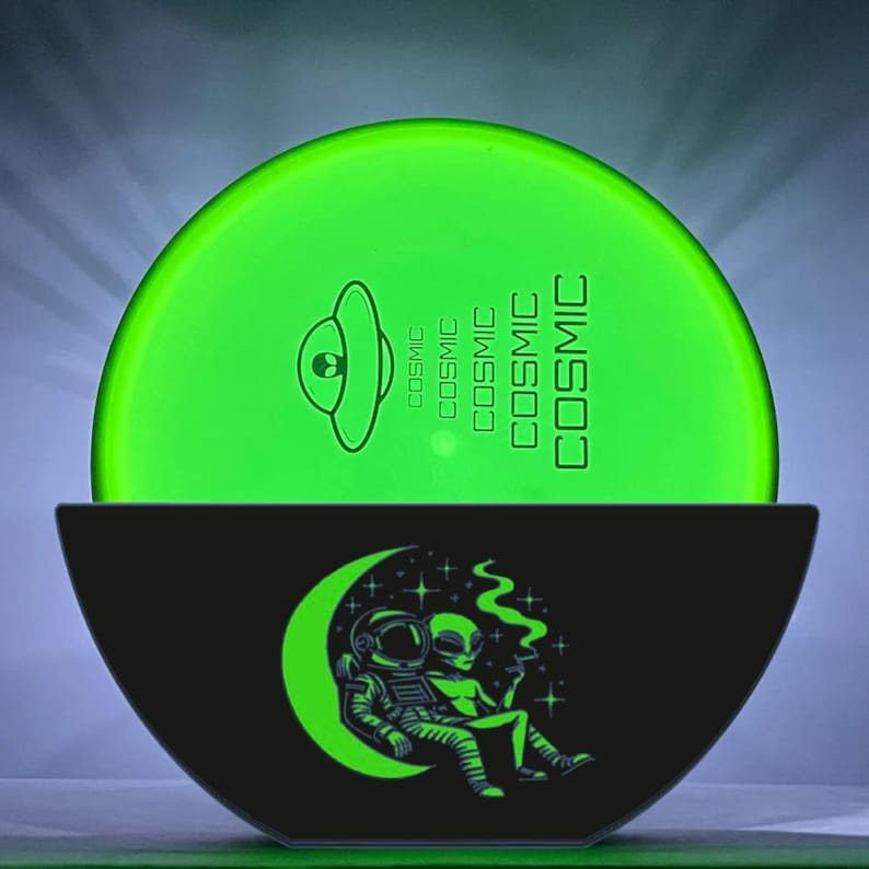 El cargador luminoso para disc golf Firefly Alien & Astronaut