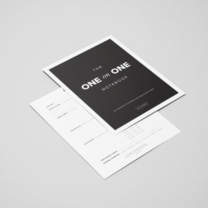 May include: A black and white notebook with the title "The One on One Notebook" for intentional mentoring and compassionate leadership. The notebook has 50 pages.