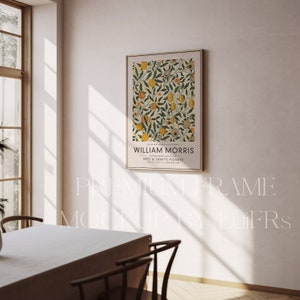 May include: A framed print of a botanical illustration featuring a lemon tree with yellow lemons and pink flowers. The print is titled "William Morris, Cotton Prints Collection, Arts & Crafts Pioneer".