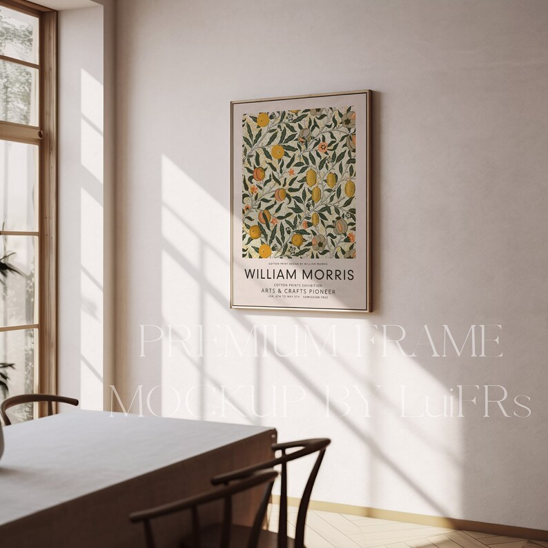 May include: A framed print of a botanical illustration featuring a lemon tree with yellow lemons and pink flowers. The print is titled "William Morris, Cotton Prints Collection, Arts & Crafts Pioneer".