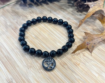 Pulsera con dijes Pave Ohm, piedras preciosas de ónix negro