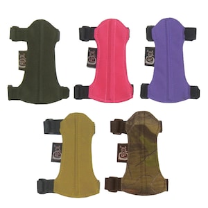May include: Five different colored archery arm guards. The arm guards are made of a soft, padded material and have adjustable straps. The arm guards are all labeled "CAROL".