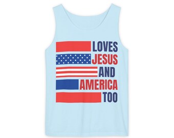 May include: A light blue sleeveless shirt with a red, white, and blue American flag graphic and the text "LOVES JESUS AND AMERICA TOO".