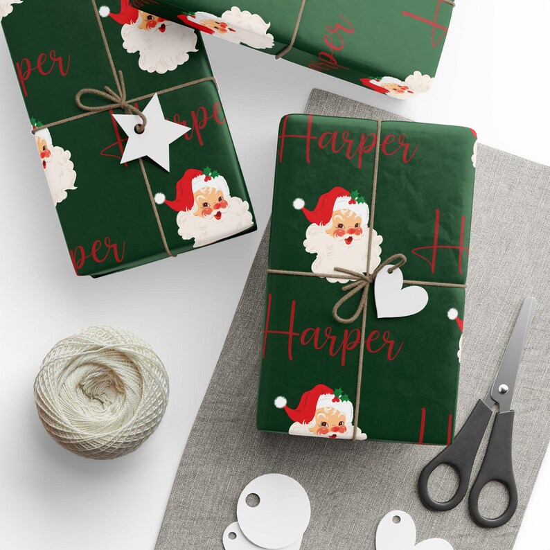 May include: Green wrapping paper with a repeating pattern of vintage Santa Claus illustrations and the name "Harper" in red lettering.