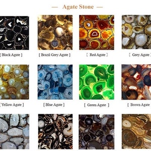 May include: A collection of agate stones in various colors, including black, grey, red, yellow, blue, green, and brown. Each stone has a unique pattern of concentric circles and bands.