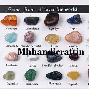 May include: A collection of 20 different gemstones, each labeled with its name. The gemstones are arranged in a grid pattern on a white background. The gemstones include amethyst, carnelian, citrine, crystal, fluorite, garnet, graptolite, howlite, labradorite, lapis lazuli, moss agate, purple agate, red jasper, rhodonite, rose quartz, snowflake obsidian, strawberry crystal, sunstone, topazite, and white agate.