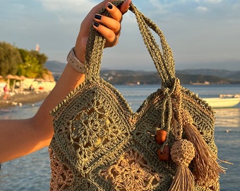 Handmade Beige and Dark Green Shoulder Bag with Flower Motifs, Tassel Accents, and Wooden-Like Embellishments