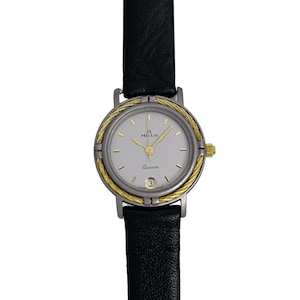 Milus Swiss Made Ladies Vintage 1980&#39;s Quartz Braided Gold Bezel 23mm