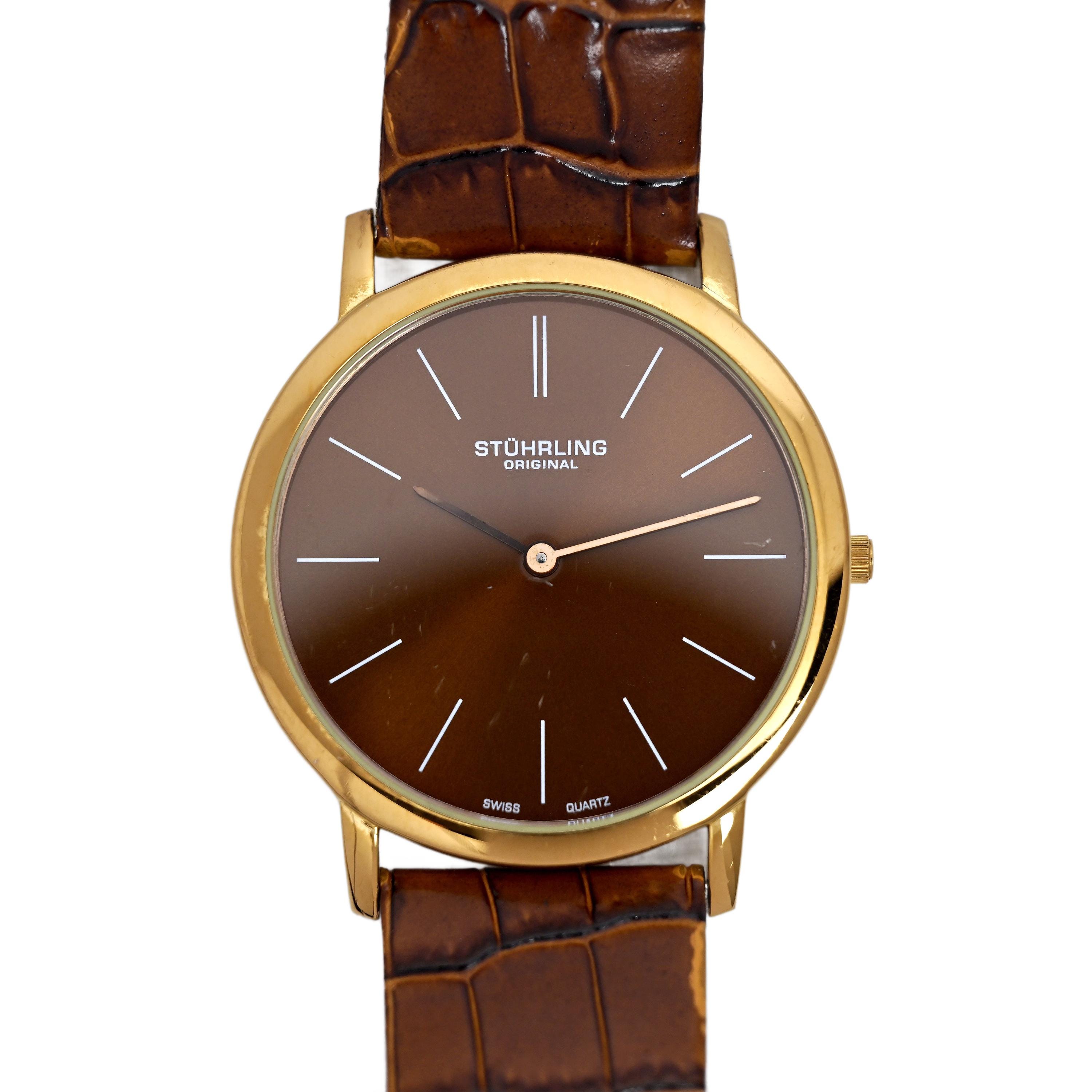 Stuhrling Ascot-polshorloge 38 mm heren bruine wijzerplaat roségoud Zwitsers quartz