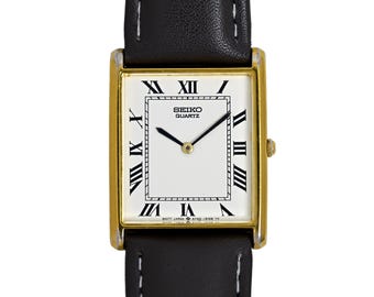 RARE vintage Seiko ladies gold tone tank Watch Roman numerals 