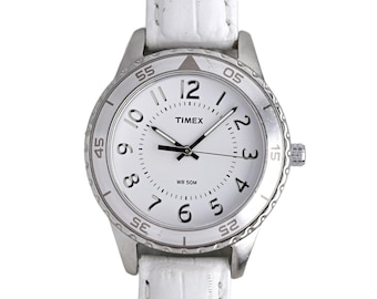 Reloj Timex con correa de cuero blanca, caja plateada, bisel giratorio, WR 50 M analógico