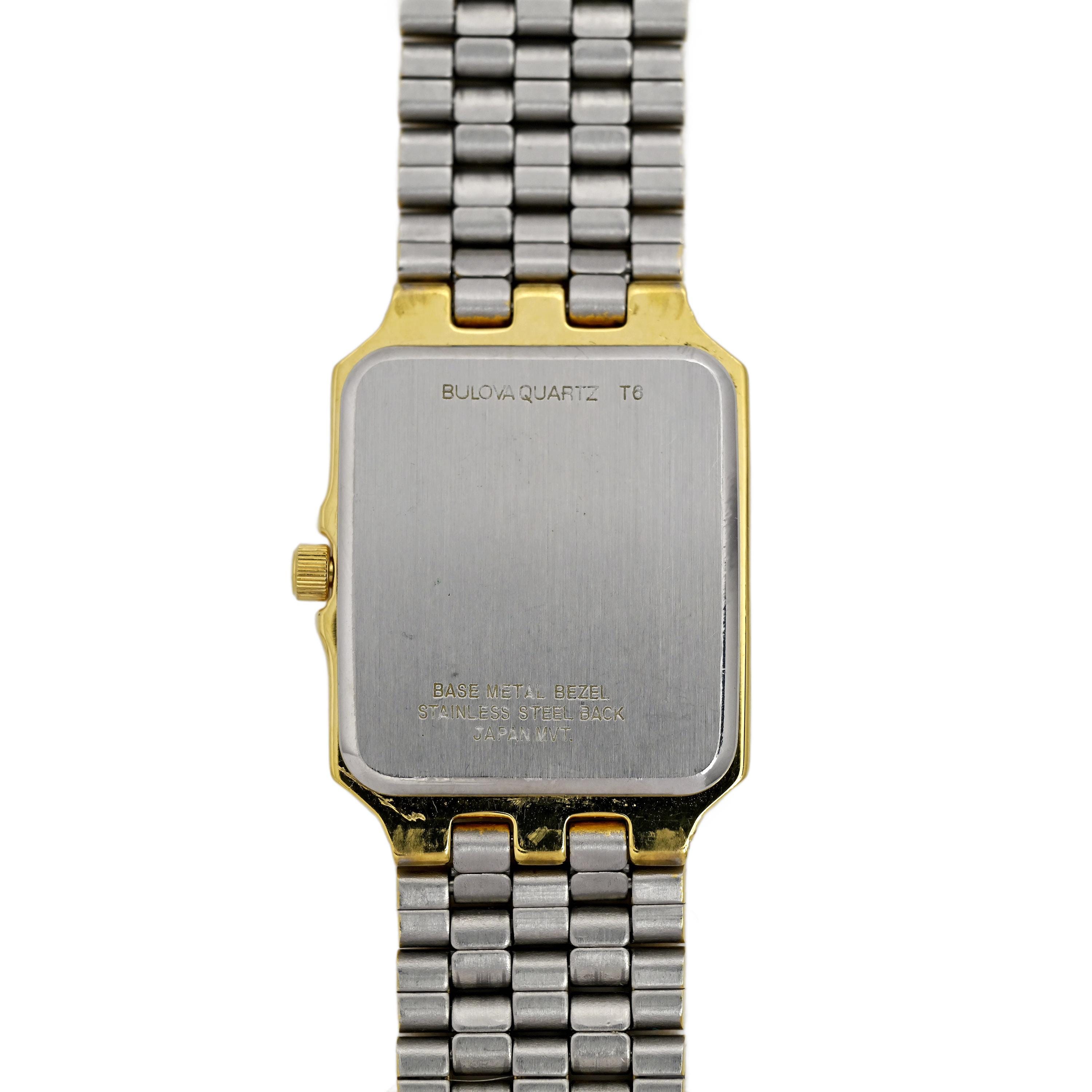 Bulova quartz t8 base metal bezel deals