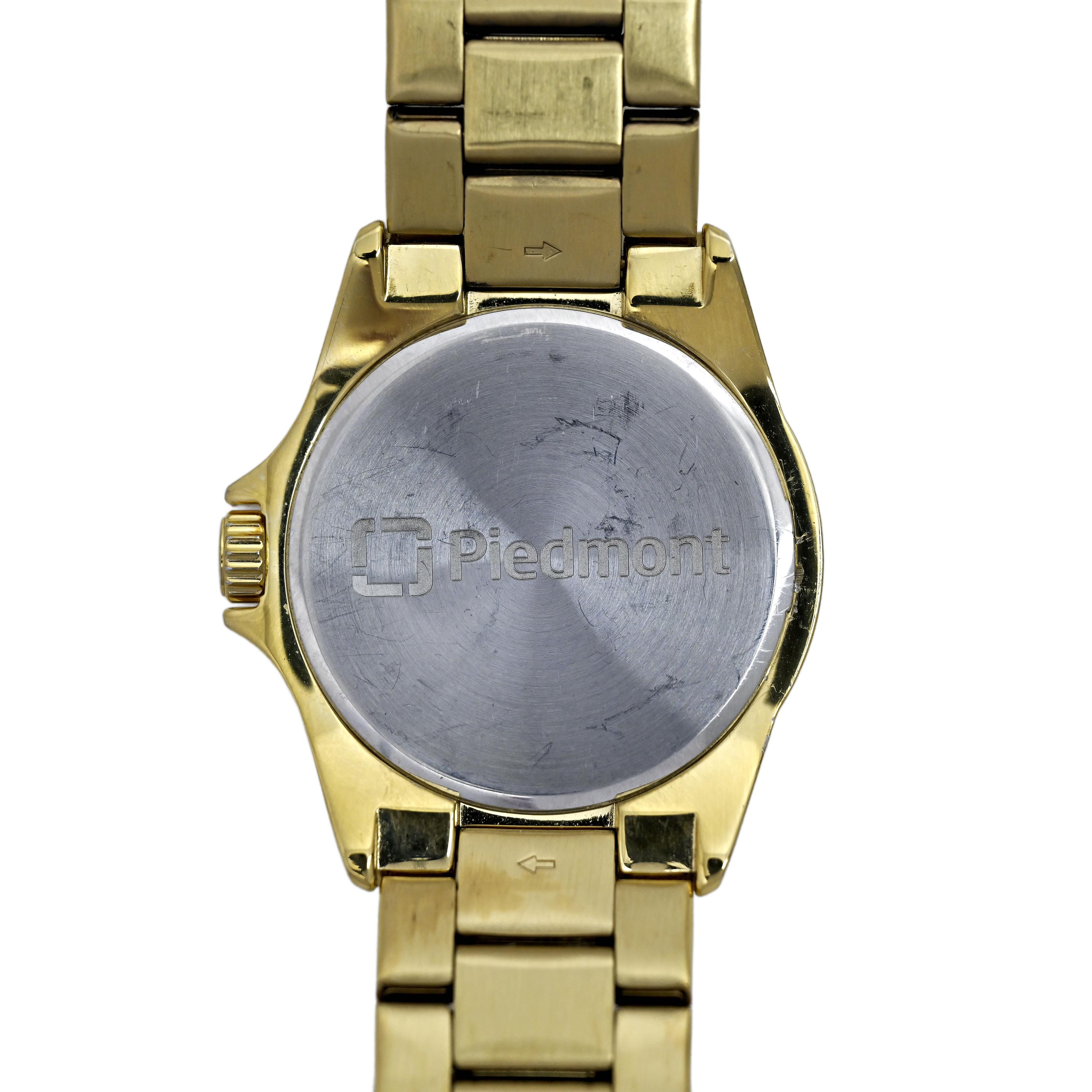 Juicy Couture Ladies Gold Plated Diamond Bezel Wrist Watch