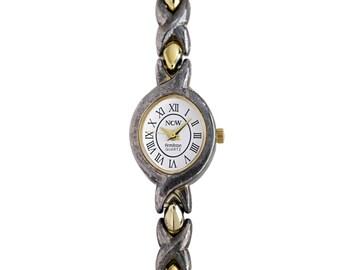 Armitron NOW Vintage Ladies Two Tone XO Bracelet Watch Roman Numerals