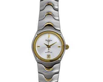 Reloj de pulsera vintage de acero inoxidable para mujer Armitron Now en dos tonos