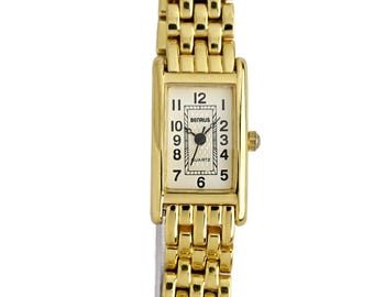 Reloj Benrus para mujer, rectangular, dorado, con esfera blanca y pulsera de metal, de cuarzo.