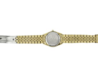 Reloj unisex Cyma de cuarzo suizo de los años 90, 31 mm, chapado en oro, grabado, en excelente estado.