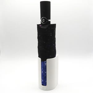 Camper umbrella holder with large starry sky umbrella