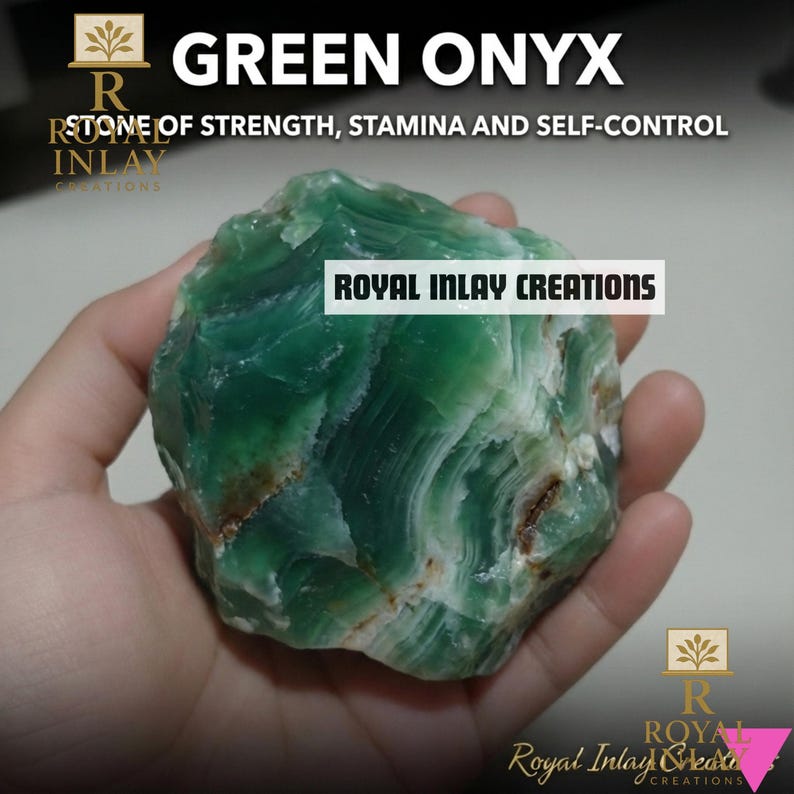 May include: A hand holding a polished green onyx stone. The stone has a layered appearance with white and brown inclusions. Text on the image reads "GREEN ONYX" and "STONE OF STRENGTH, STAMINA AND SELF-CONTROL". The brand name "ROYAL INLAY CREATIONS" is also visible.