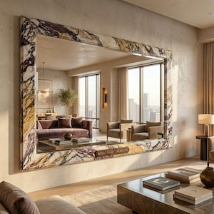 May include: A large rectangular wall mirror featuring a thick frame made of polished marble with prominent veins of purple, gold, and white. A small rectangular plaque at the bottom centre of the frame displays the text ROYAL INLAY CREATIONS.