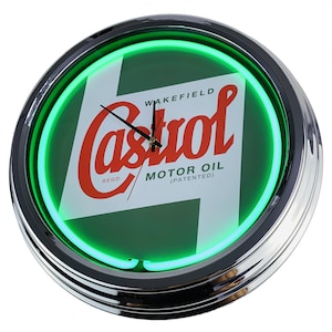 Może przedstawiać: Zielony neonowy zegar z białą tarczą, na której widnieje logo Castrol i napis "WAKEFIELD MOTOR OIL (PATENTED)".