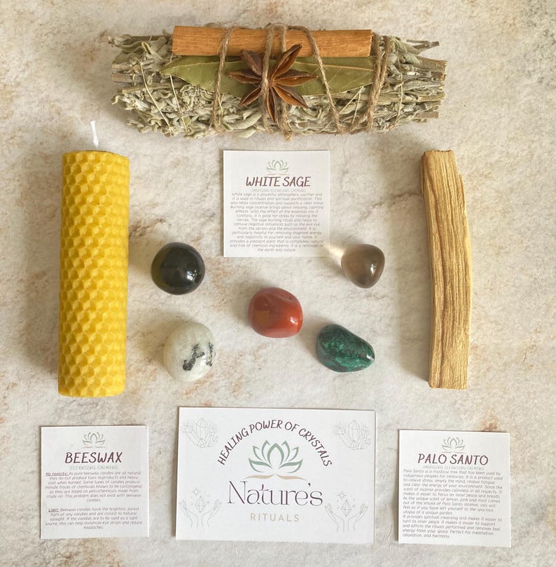May include: A set of crystals, palo santo, white sage, beeswax candle, and a card that reads "Healing Power of Crystals, Nature's Rituals".